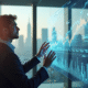 Jeune entrepreneur analysant des graphiques financiers futuristes